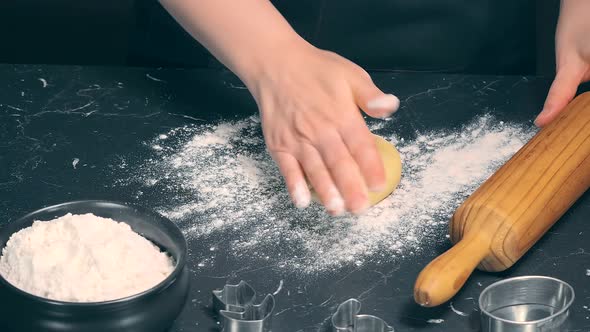 Woman Prepares Butter Cookies at Home in the Kitchen