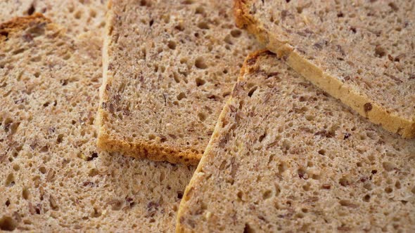 Wholegrain sliced bread with a crispy brown crust. Healthy foodstuff