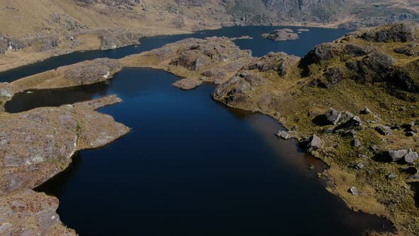 4k aerial drone footage over the 5th lagoon of Pichgacocha from Ambo, Huanuco, Peru in the Andes mou