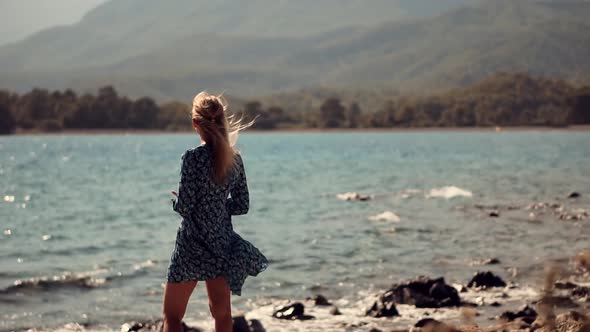 Woman Hair Flowing On Wind. Lady Enjoying Holiday Vacation And Looking On Sea. Hair Flying Blowing.