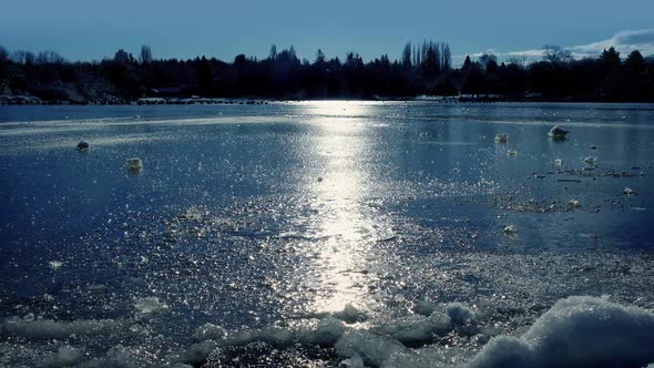 Moving Across Frozen Lake On Sunny Day