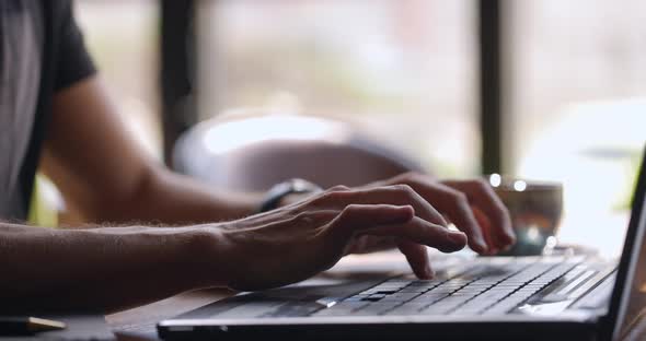 Male User Hands Typing on Laptop Keyboard Sit at Table Businessman Student Professional Study Work