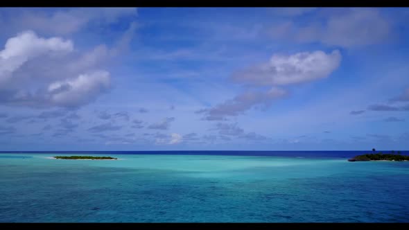 Aerial panorama of luxury resort beach journey by transparent ocean with white sand background of jo