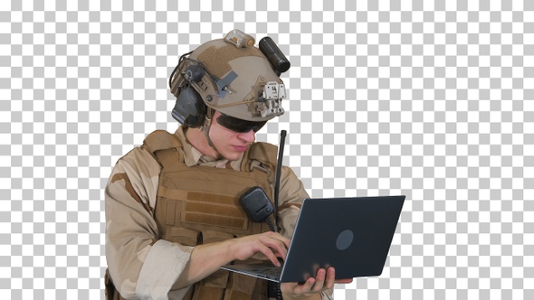 Marine standing and using laptop, Alpha Channel