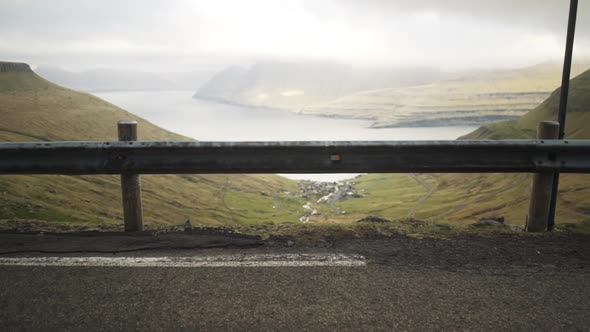 Man Looking Down Towards Funningur