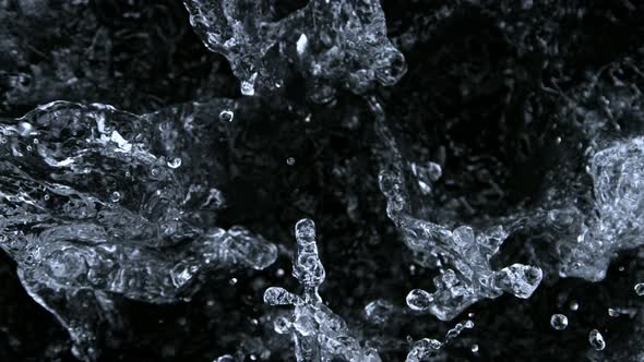 Super Slow Motion Shot of Splashing Water Isolated on Black Background at 1000 Fps