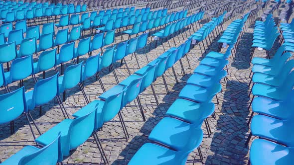 Long Rows of Blue Seat Chairs for Local Events Observation