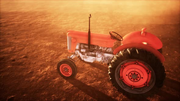 Vintage Retro Tractor on a Farm in Desert