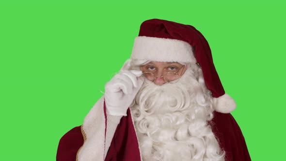 Santa Claus Tilting Glasses and Laughing Hohoho (Green Screen)