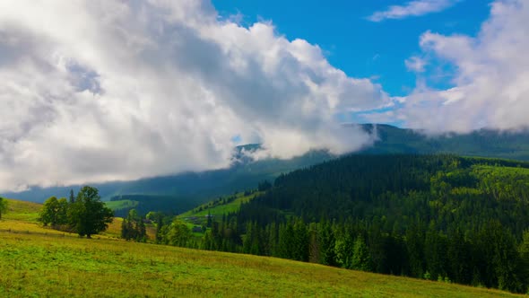 Mountain Landscape with a Fast Clouds and Shadows