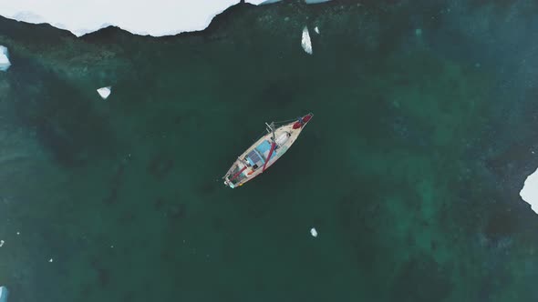 Yacht Sail in Arctic Ocean Aerial Top Down View