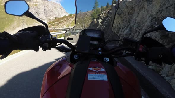 POV Biker Rides on Motorbike By Scenic Mountain Pass in Swiss Alps Moto Trip