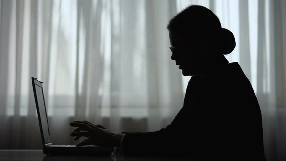 Silhouette of Nervous Woman Closing Laptop Working Late at Night, Lack of Ideas