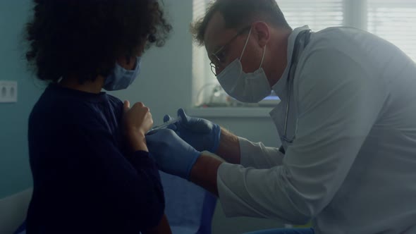 Girl Taking Dose Covid Vaccine in Clinic Close Up