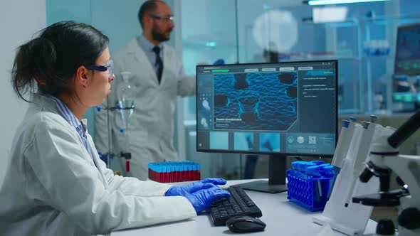 Portrait of Scientist Looking Tired at Camera