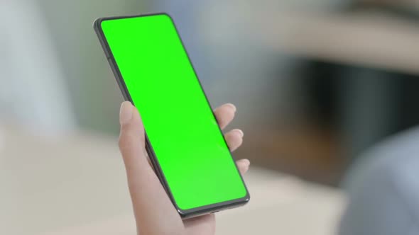 Close Up of Woman Using Smartphone with Green Screen