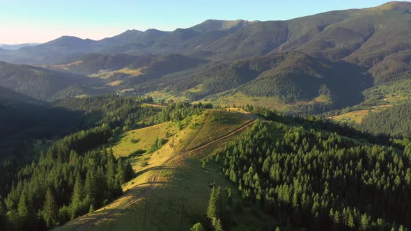 Spectacular mountain valley on a sunny day and alpine meadows.