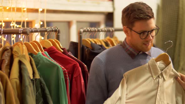 Couple Choosing Clothes at Vintage Clothing Store 47