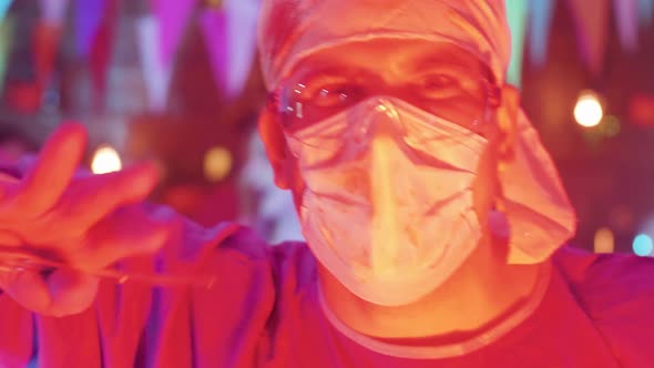 Close-up Portrait of a Young Man Dressed in the Costume of a Mad Killer Doctor