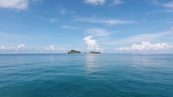 Drone Sea shore Beach panning to island