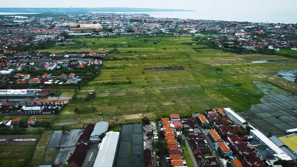 Wonderful Denpasar city drone with houses and rice field footage in Bali. This footage was shot duri