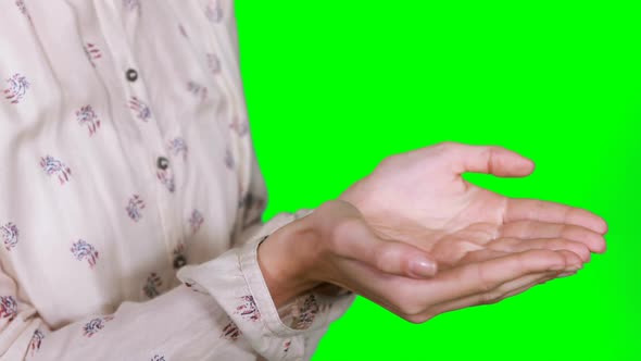 Woman pretending to touch an invisible object