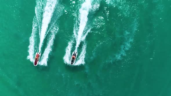 Aerial: View From Above. Two Water Bikes Jet Ski Floats on the Sea.