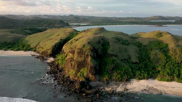 Fantastic scenery of the green hills and white sandy beaches on the coast of Lombok. Merese Hills, B