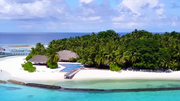 Aerial view panorama of tropical resort beach by blue ocean and sand background