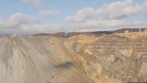 Open-pit mine soil in layers slow tilt 4K 2160p 30fps UltraHD footage - Polluted nature after minera