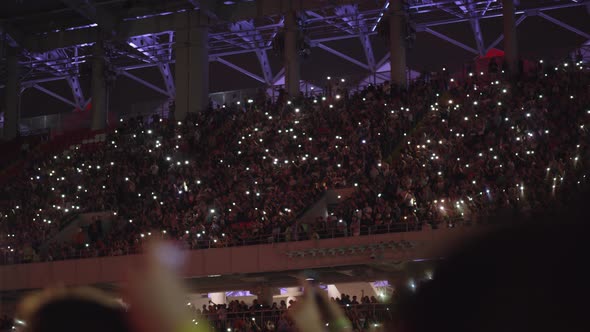 A Beautiful View of Crowded Tribunes on a Music Concert