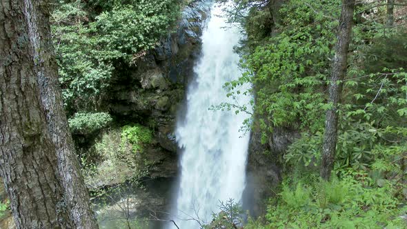 Waterfall Water Falls Down Steep Slope in Forest