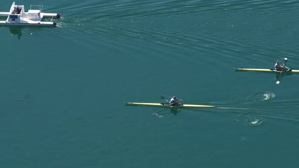 Professional Athletes Rowing Boats at Competition, Water Sports, Slow Motion