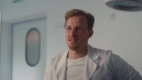 Doctor Meeting Patient Putting Mask on Face in Modern Hospital Office Close Up