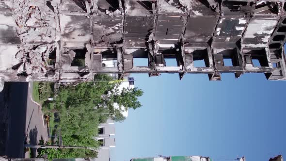 Vertical Video of the Consequences of the War in Ukraine  Burned Cars