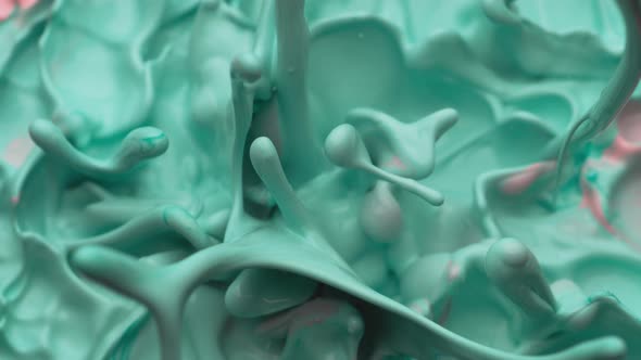 Paint bouncing and making splashes. Slow Motion. Unedited version is included at the end of clip. alt