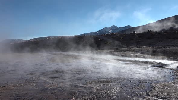 Chile. Atacama Desert. Valley of geysers. El Tatio geysers steaming