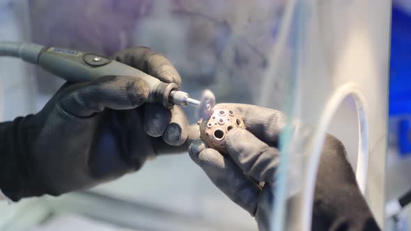 Jeweler Hands Working With A Ring