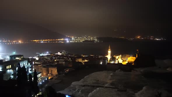 Sea Waves Run on the Coast of Budva at Night