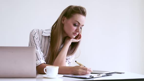 Blonde Business Woman Working at Modern Office