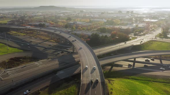 Drone Flying Above Multi Level Highway Interchange on Sunny Evening USA