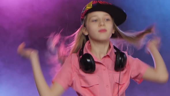 Stylish Teenager Girl Plays Music at Dj Table, Smoky Background alt