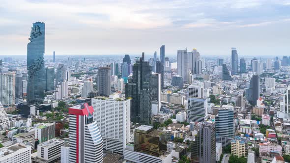 Bangkok business district city center above Silom area, day to night, zoom out - Time Lapse