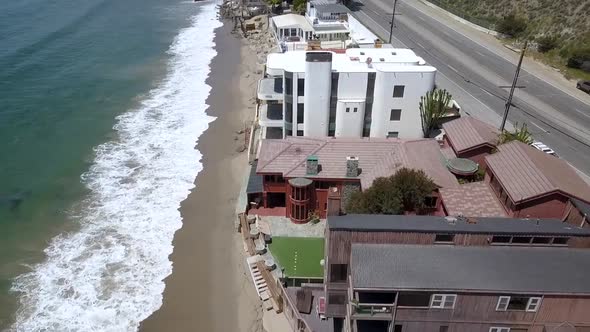 Pacific Coast Highway luxury Villas and Beach houses.Amazing aerial view flight pull out drone foot