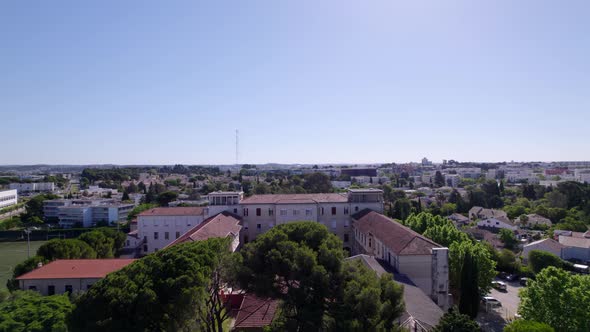 Enormous building with a tree in the middle in the south of France, Montpellier.