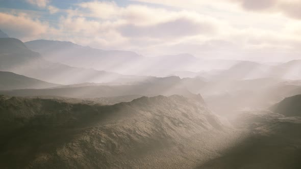 Aerial Vulcanic Desert Landscape with Rays of Light