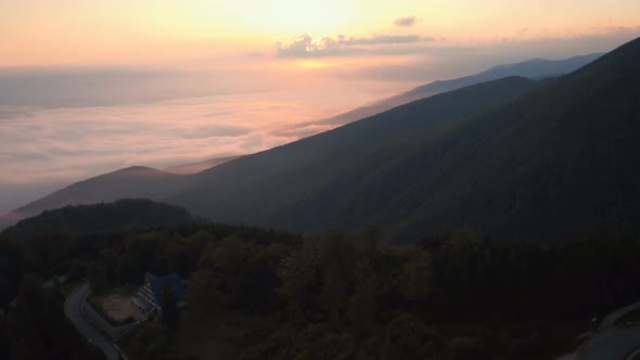 Aerial view of hills at sunset