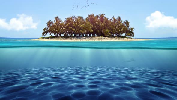 Half underwater view of the tropical island on sunny day. Seamless loop.