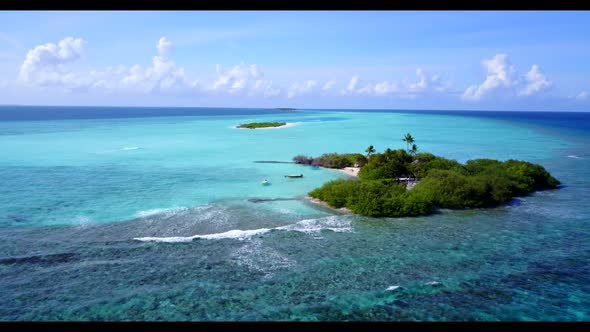 Aerial drone view texture of relaxing shore beach time by shallow water and white sandy background o