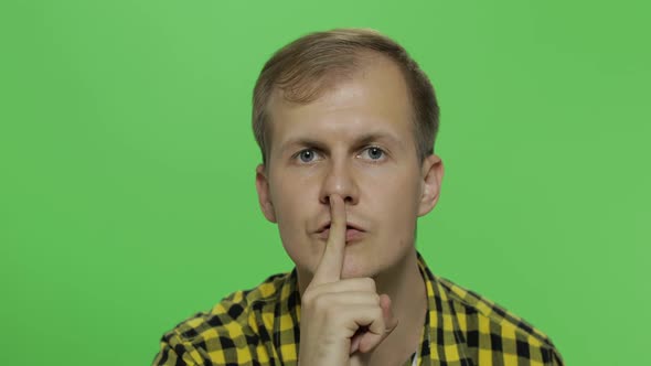Man Keeping a Secret or Asking for Silence, Serious Face, Obedience Concept